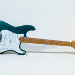 Lynx Translucent Teal Flame Maple Neck