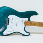 Lynx Translucent Teal Flame Maple Neck
