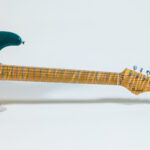 Lynx Translucent Teal Flame Maple Neck