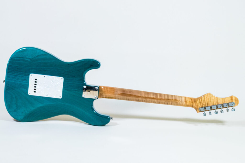 Lynx Translucent Teal Flame Maple Neck