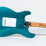 Lynx Translucent Teal Flame Maple Neck