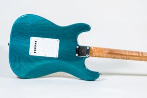 Lynx Translucent Teal Flame Maple Neck