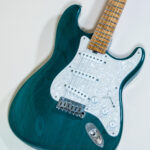Lynx Translucent Teal Flame Maple Neck