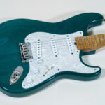 Lynx Translucent Teal Flame Maple Neck