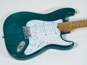Lynx Translucent Teal Flame Maple Neck