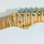 Lynx Translucent Teal Flame Maple Neck