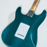 Lynx Translucent Teal Flame Maple Neck