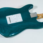 Lynx Translucent Teal Flame Maple Neck