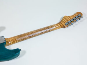 Lynx Translucent Teal Flame Maple Neck