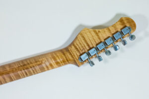 Lynx Translucent Teal Flame Maple Neck