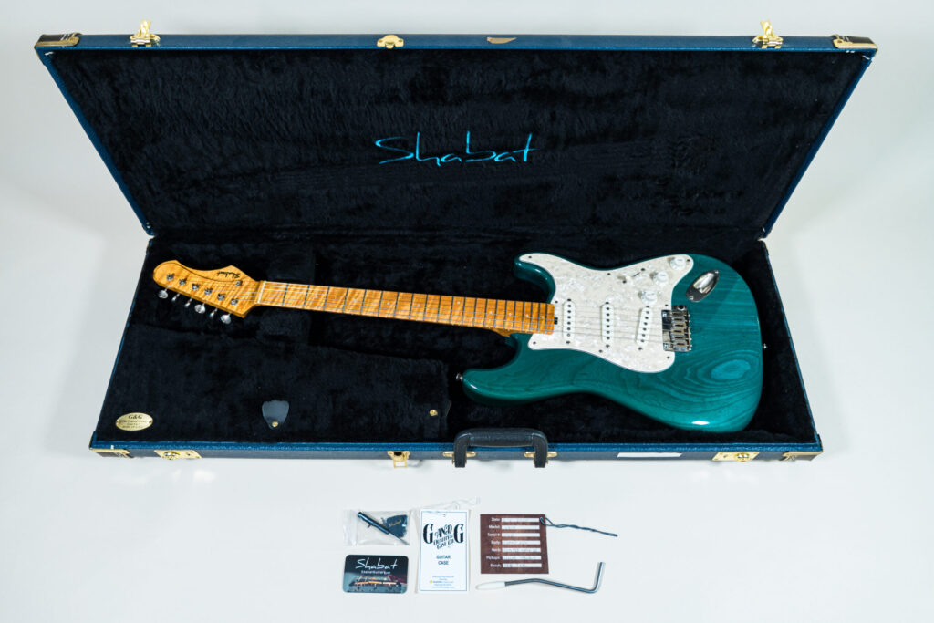 Lynx Translucent Teal Flame Maple Neck
