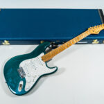 Lynx Translucent Teal Flame Maple Neck